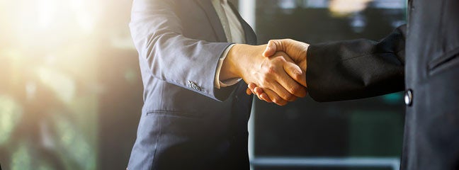 Businessmen shaking hands | Boca Law in Boca Raton FL